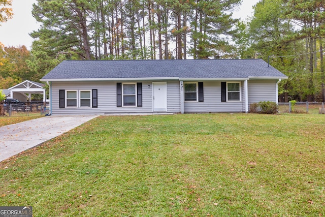 single story home with a front yard