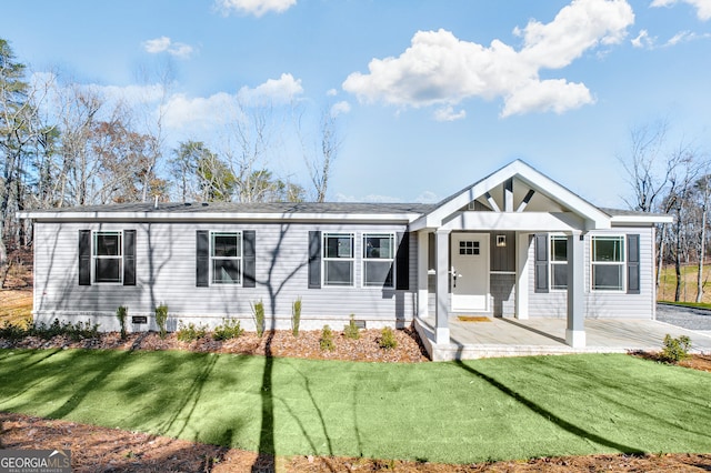 view of front of home with a front lawn