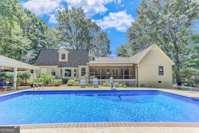 view of swimming pool featuring a patio