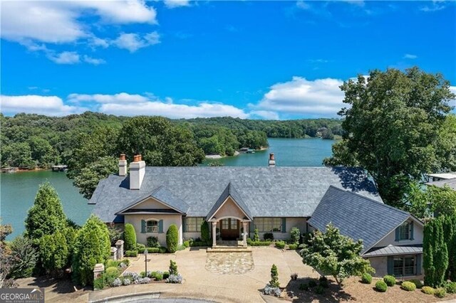 view of front of house featuring a water view