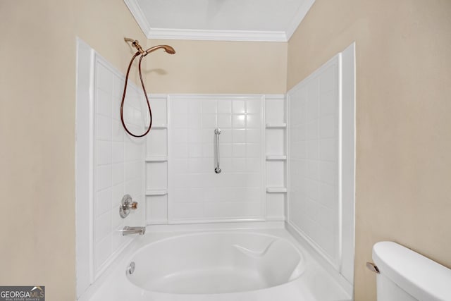 bathroom featuring crown molding, toilet, and tub / shower combination