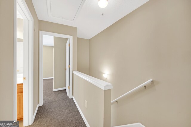 unfurnished room with carpet and vaulted ceiling