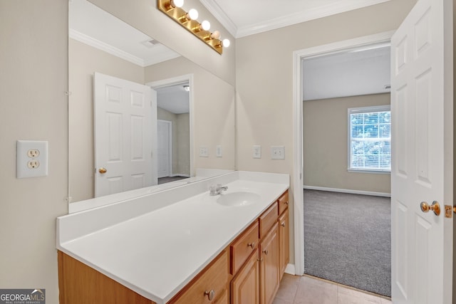 bathroom with tile patterned flooring, vanity, and ornamental molding