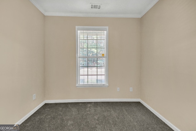 carpeted empty room featuring ornamental molding