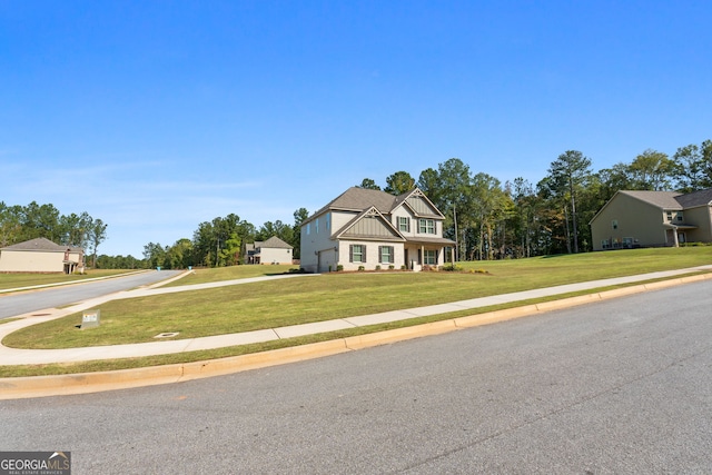 view of front of home with a front yard