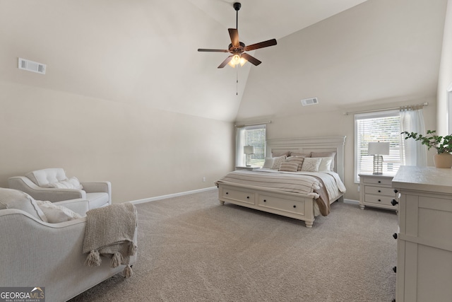 carpeted bedroom featuring high vaulted ceiling and ceiling fan