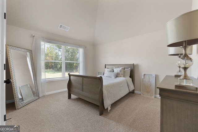 bedroom with light carpet