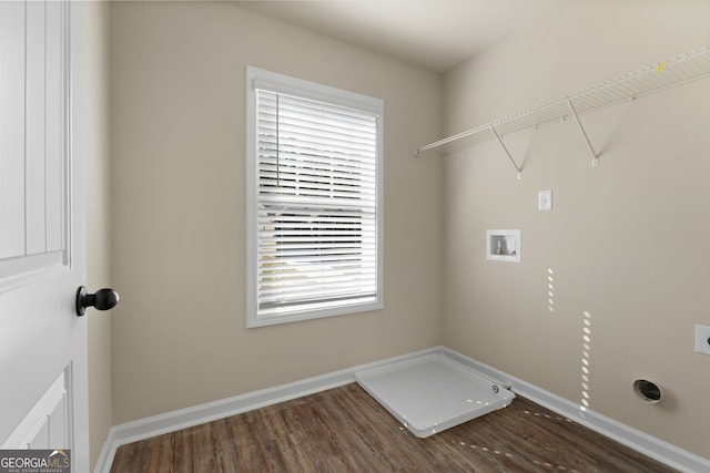 washroom with dark wood-type flooring, plenty of natural light, hookup for an electric dryer, and washer hookup