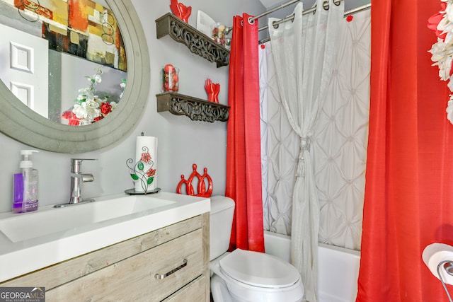 full bathroom with shower / bath combo, toilet, and vanity