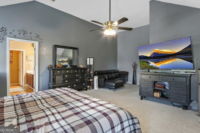 bedroom with high vaulted ceiling, ceiling fan, connected bathroom, and carpet floors