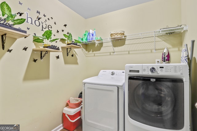 laundry room with washer and dryer