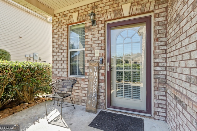 property entrance with covered porch