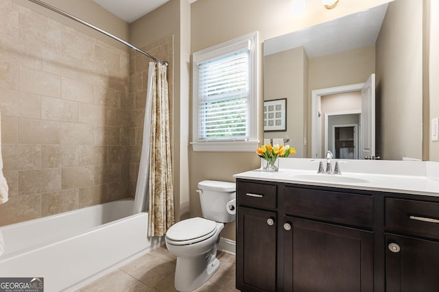 full bathroom with vanity, toilet, shower / tub combo with curtain, and tile patterned floors