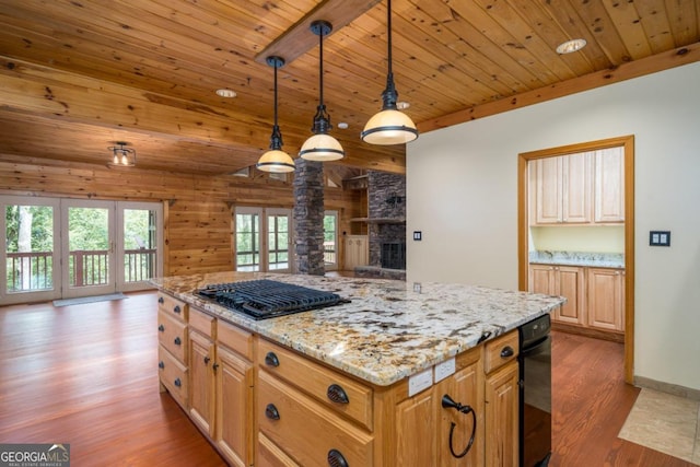 kitchen featuring hanging light fixtures, black gas cooktop, light hardwood / wood-style flooring, wood walls, and wood ceiling