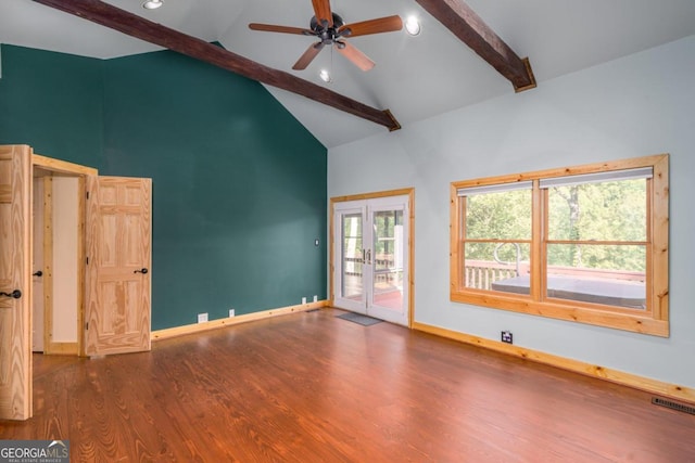 unfurnished room with beamed ceiling, ceiling fan, dark hardwood / wood-style flooring, and high vaulted ceiling