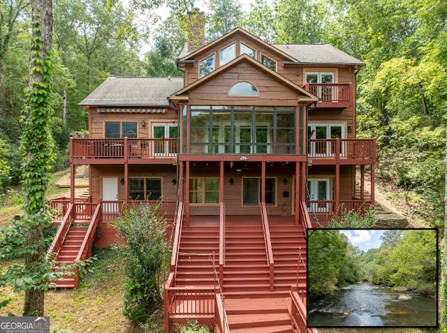 back of property featuring a sunroom