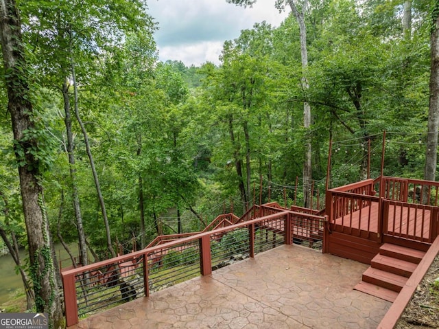 deck featuring a patio area