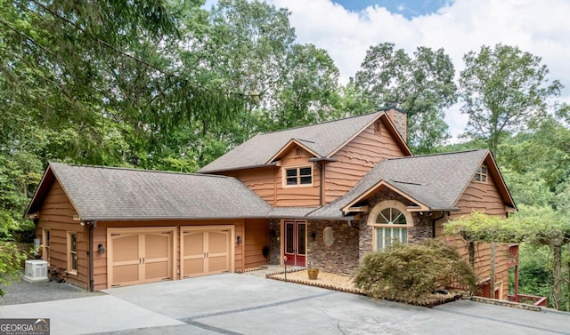 view of front of property with a garage