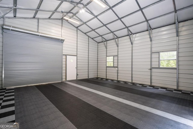 garage featuring a carport