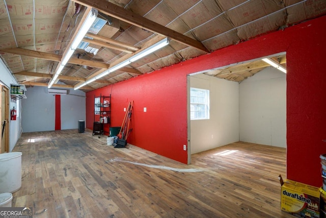 miscellaneous room featuring wood ceiling, dark wood-type flooring, and lofted ceiling