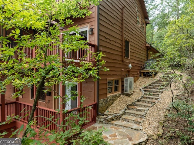 view of home's exterior with ac unit