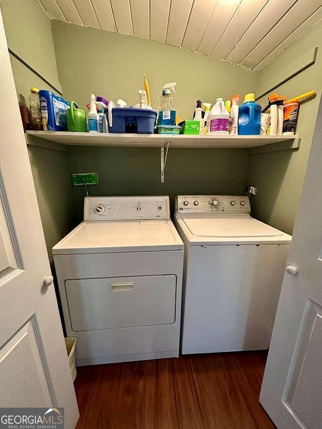 washroom with wooden ceiling, laundry area, separate washer and dryer, and dark wood-style flooring