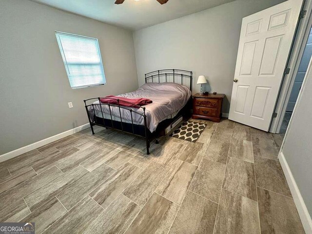 bedroom featuring ceiling fan and light hardwood / wood-style flooring