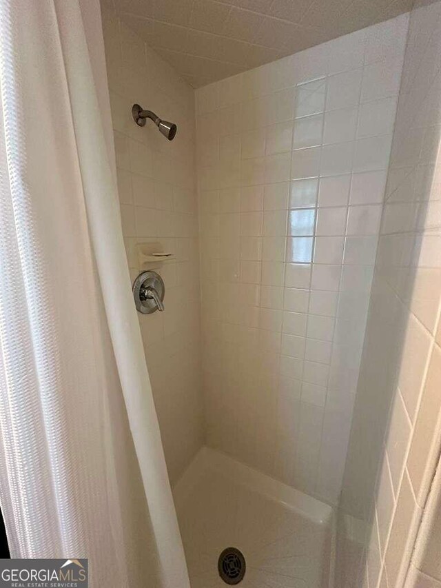 bathroom with walk in shower