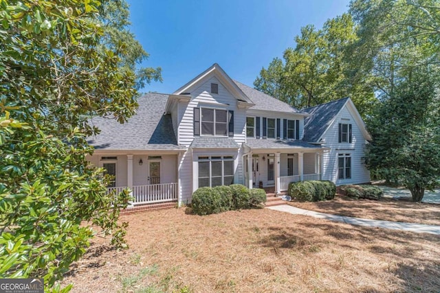 view of front of property featuring covered porch