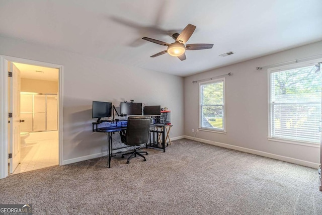 office area with ceiling fan and light colored carpet