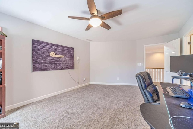 home office featuring carpet flooring and ceiling fan