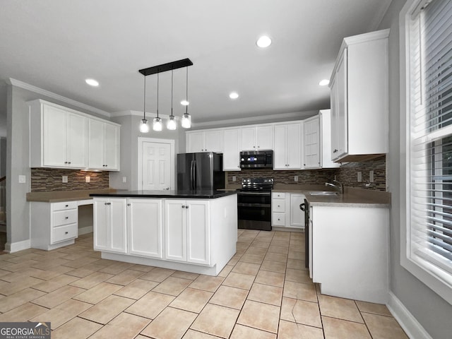 305 Crest Pointe S, Bremen, GA 30110 - kitchen with stainless steel microwave, freestanding refrigerator, range with electric cooktop, backsplash, and crown molding