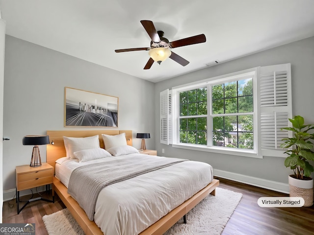 305 Crest Pointe S, Bremen, GA 30110 - bedroom featuring baseboards, wood finished floors, and ceiling fan
