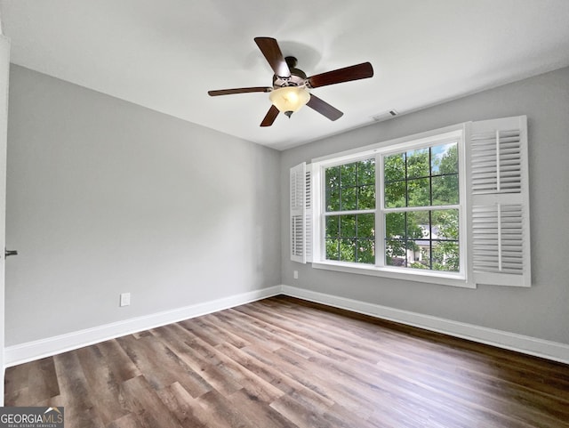 305 Crest Pointe S, Bremen, GA 30110 - spare room featuring baseboards, wood finished floors, and a ceiling fan