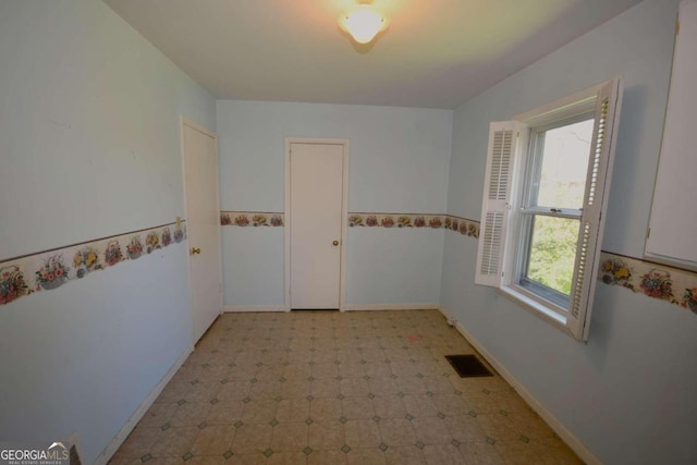 view of tiled spare room