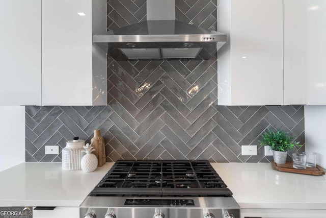 kitchen with white cabinetry, light countertops, and modern cabinets