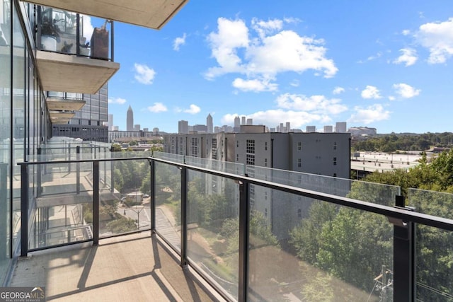 balcony featuring a view of city