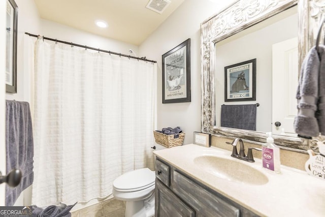 133 Oak Dr, Gray, GA 31032 - bathroom featuring toilet, vanity, recessed lighting, and tile patterned flooring