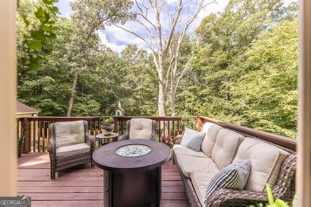 deck with an outdoor hangout area