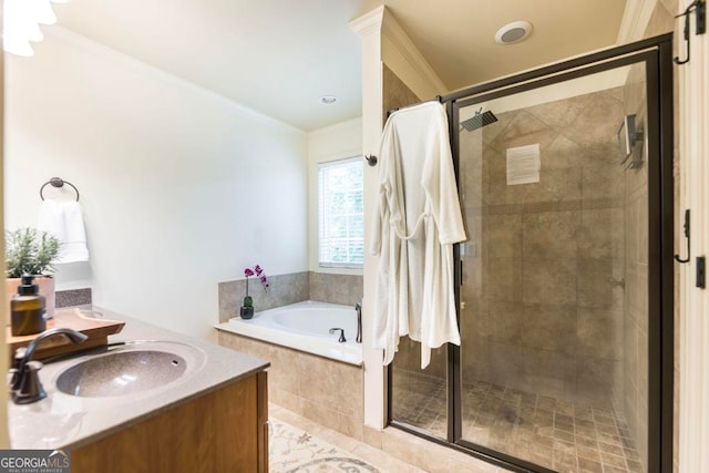 bathroom with vanity, independent shower and bath, and ornamental molding