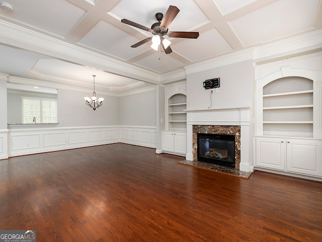 unfurnished living room featuring ceiling fan with notable chandelier, coffered ceiling, dark hardwood / wood-style floors, and a high end fireplace