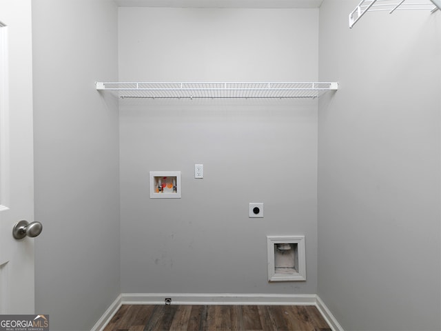 washroom featuring hookup for a washing machine, dark hardwood / wood-style floors, and hookup for an electric dryer