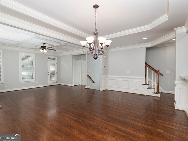 empty room featuring ceiling fan with notable chandelier, coffered ceiling, dark hardwood / wood-style floors, and ornamental molding