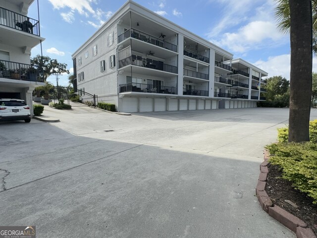 view of property with community garages