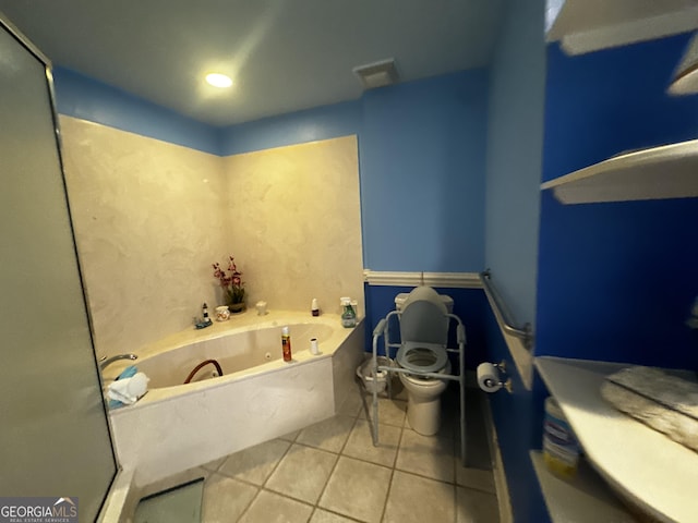 bathroom with a whirlpool tub, visible vents, toilet, and tile patterned floors