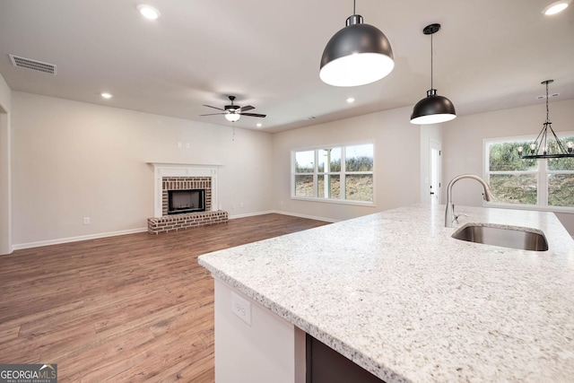 carpeted empty room featuring a tray ceiling, crown molding, and ceiling fan