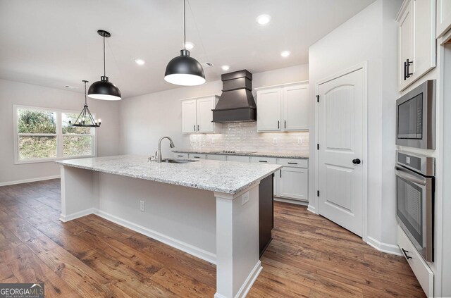 unfurnished room with a tray ceiling, ceiling fan, crown molding, and light colored carpet