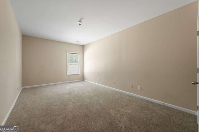 empty room with light carpet