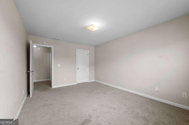 unfurnished bedroom featuring carpet floors