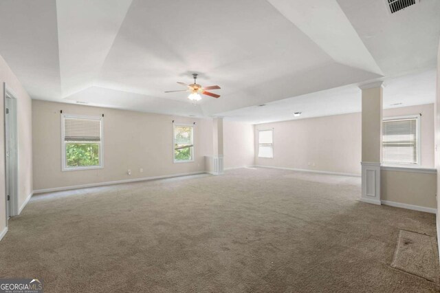 carpeted empty room featuring ceiling fan